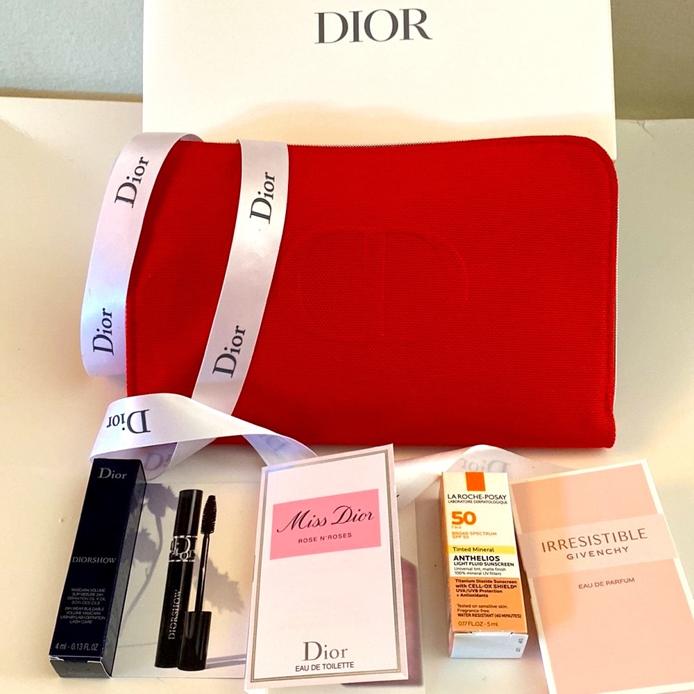 NEW DIOR ZIP POUCH 8”by 5” with 55 “ ribbon in box and samples